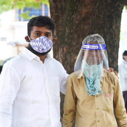 TSA Delhi's President and Treasurer distributing protective equipment during COVID-19
